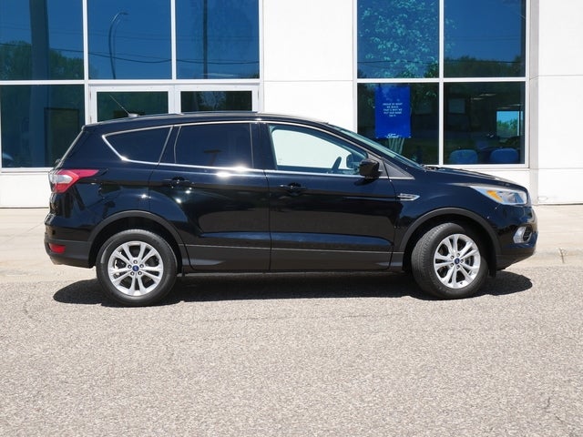 Used 2017 Ford Escape SE with VIN 1FMCU9GD0HUD85915 for sale in New Brighton, Minnesota