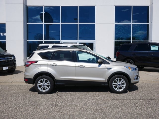 Used 2018 Ford Escape SE with VIN 1FMCU9GD0JUD50913 for sale in New Brighton, Minnesota