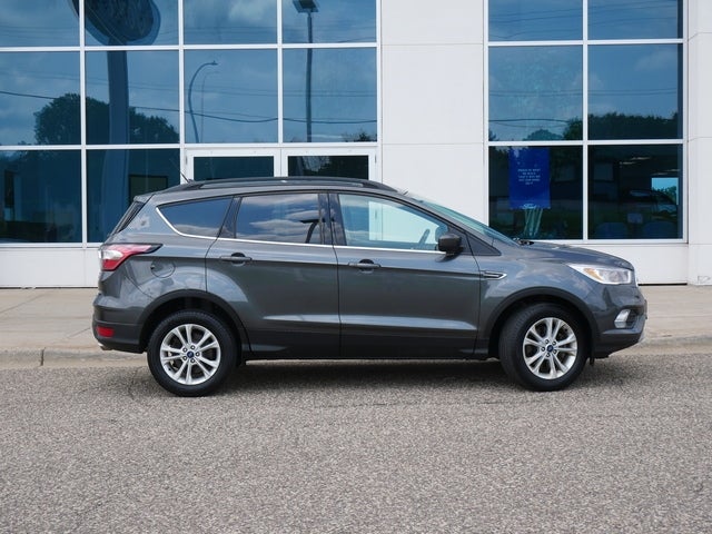 Used 2018 Ford Escape SE with VIN 1FMCU9GD3JUC62924 for sale in New Brighton, Minnesota