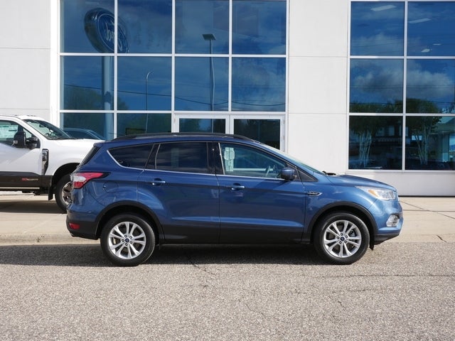 Used 2018 Ford Escape SE with VIN 1FMCU9GD5JUA55855 for sale in New Brighton, Minnesota